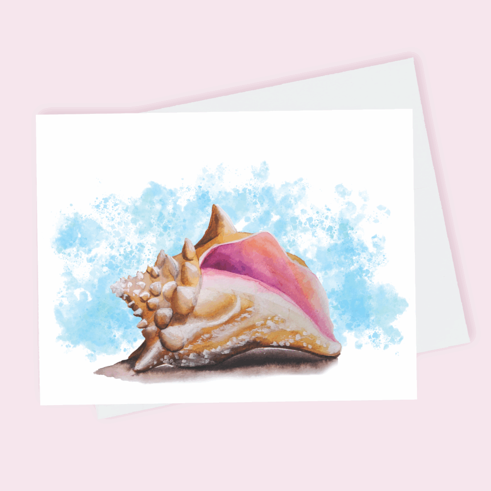 A greeting card depicting a pink conch shell set against a sky blue splattered background done in watercolor.