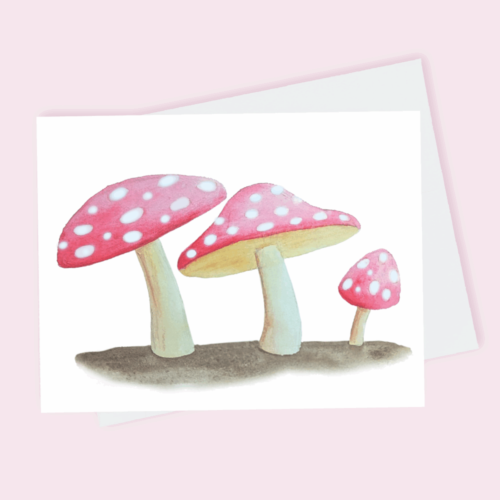 A greeting card depicting three red mushrooms with white spots and stems done in watercolor.