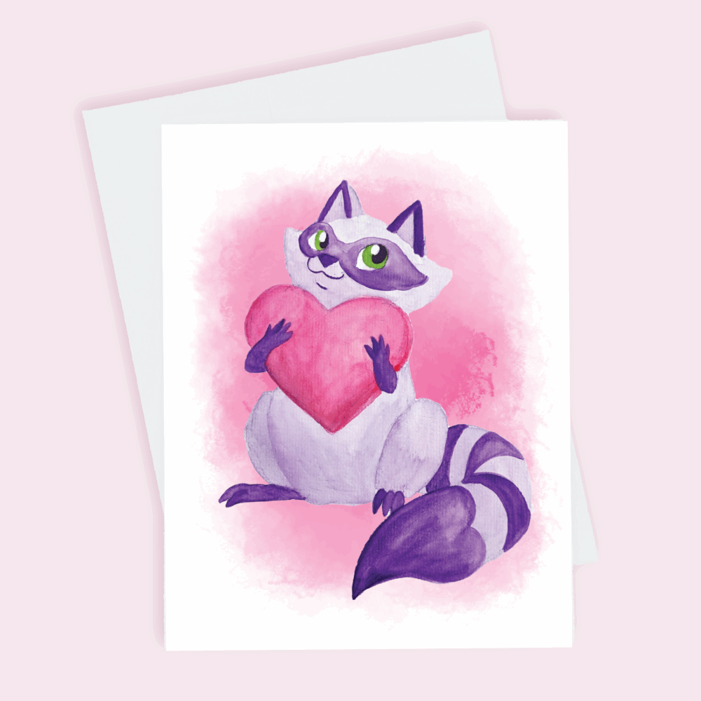 A greeting card depicting a light violet and purple racoon holding a large pink heart to its chest and set against an airbrush pink background done in watercolor.